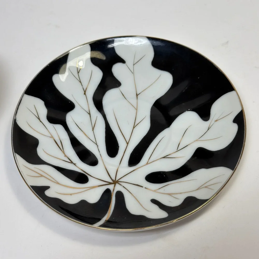 Footed Tea Cup and Saucer Black White Gold Leaf MCM Holywood Regency Art Deco